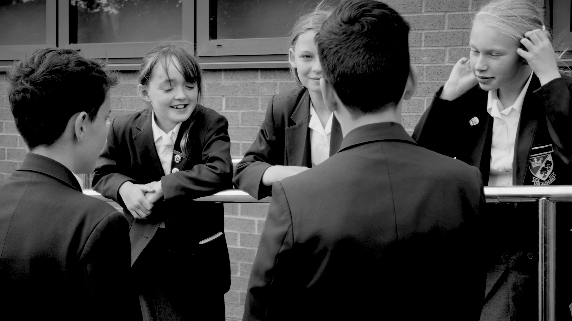 Pupils chatting outside between lessons